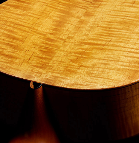 The back and heel joint of a 2024 Mark Usherovich "Romantic" classical guitar made of spruce and maple