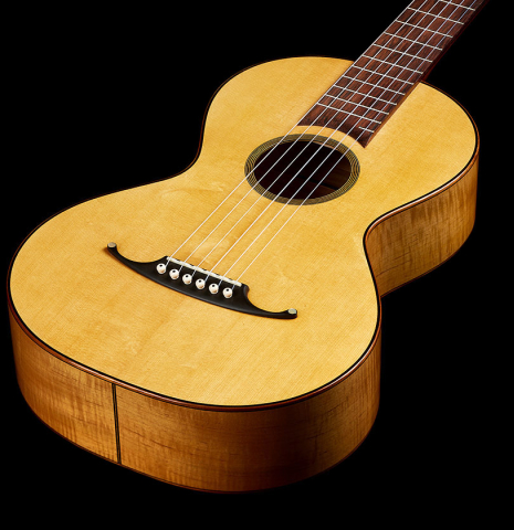 The soundboard of a 2024 Mark Usherovich "Romantic" classical guitar made of spruce and maple