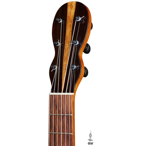 The headstock of a 2024 Mark Usherovich "Romantic" classical guitar made of spruce and maple
