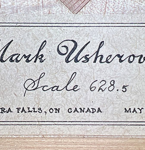 The label of a 2024 Mark Usherovich "Romantic" classical guitar made of spruce and maple