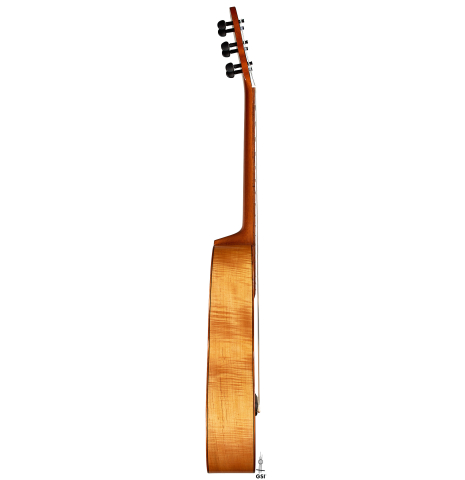 The side of a 2024 Mark Usherovich "Romantic" classical guitar made of spruce and maple