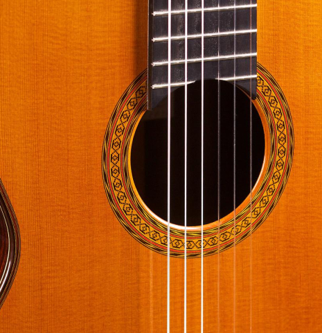 The top and rosette detail of a 1978 Manuel Velazquez classical guitar made of cedar and Indian rosewood
