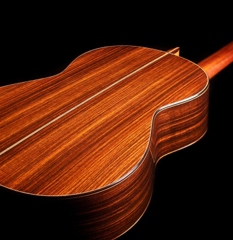 The back and sides of a 1978 Manuel Velazquez classical guitar made of cedar and Indian rosewood