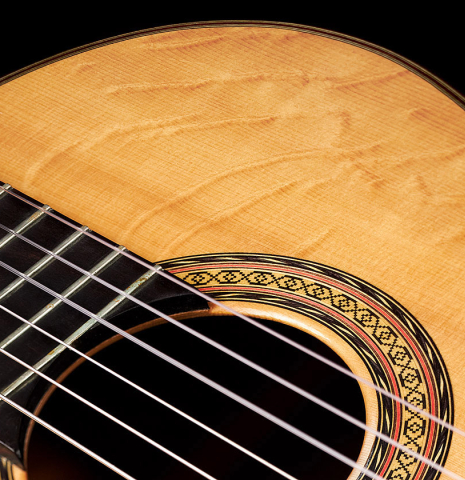 The rosette of a 2006 Manuel Velazquez classical guitar made with spruce and CSA rosewood.