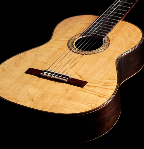 The soundboard of a 2006 Manuel Velazquez classical guitar made with spruce and CSA rosewood.