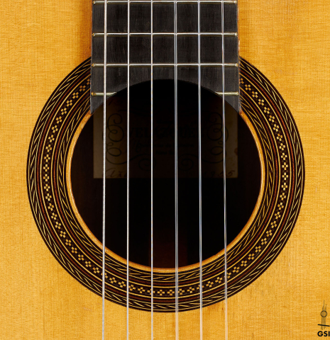 The rosette of a 1955 Manuel Velazquez classical guitar made of spruce and CSA rosewood