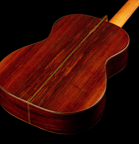 The back and sides of a 1960 Manuel Velazquez classical guitar made of spruce and CSA rosewood