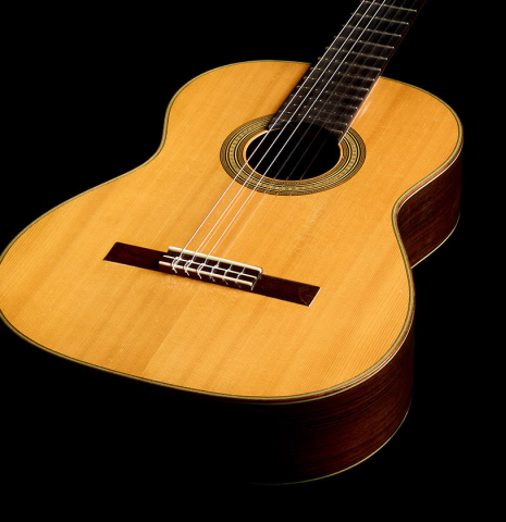 The soundboard of a 1951 Manuel Velazquez classical guitar made of spruce and CSA rosewood