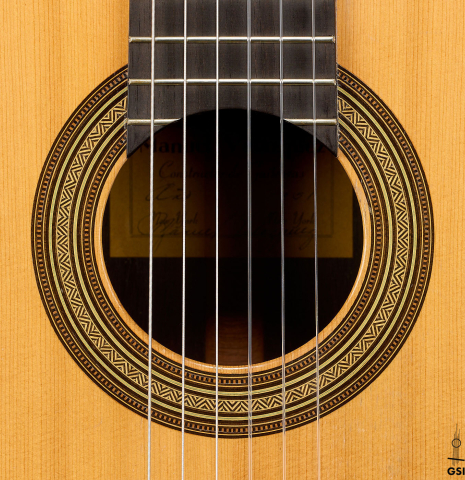 The rosette of a 1951 Manuel Velazquez classical guitar made of spruce and CSA rosewood