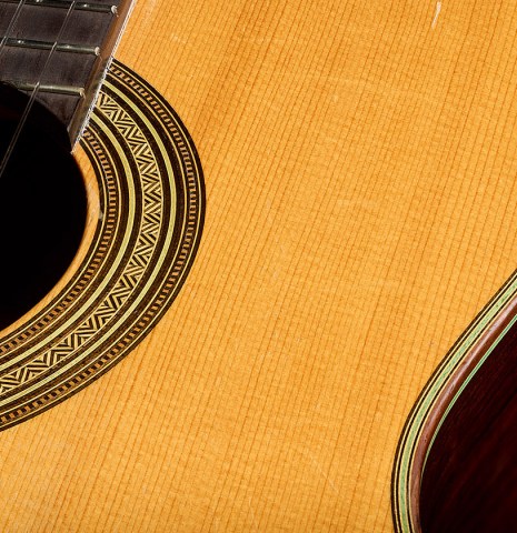 The top and rosette detail of a 1951 Manuel Velazquez classical guitar made of spruce and CSA rosewood