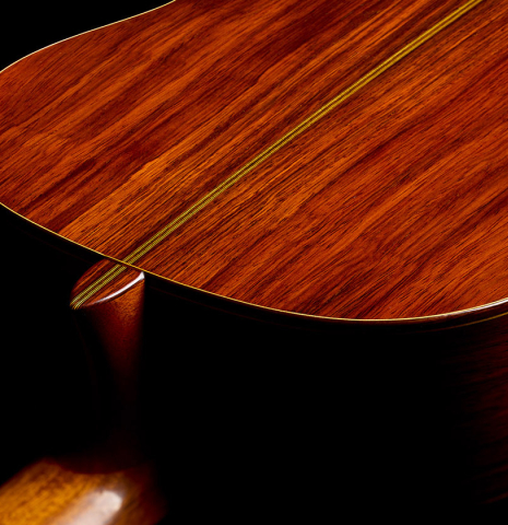 The heel, back binding and purfling of a 1996 Manuel Velazquez classical guitar made of spruce and CSA rosewood