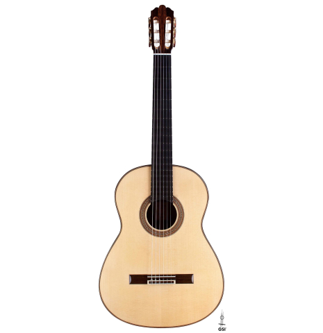 This is the front of a Jose Vigil classical guitar built in 2018 on a white background. It has a spruce soundboard and CSA rosewood back and sides.