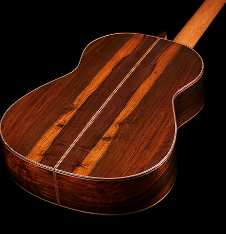 The back and sides of a 2024 Jose Vigil classical guitar made of cedar and CSA rosewood.