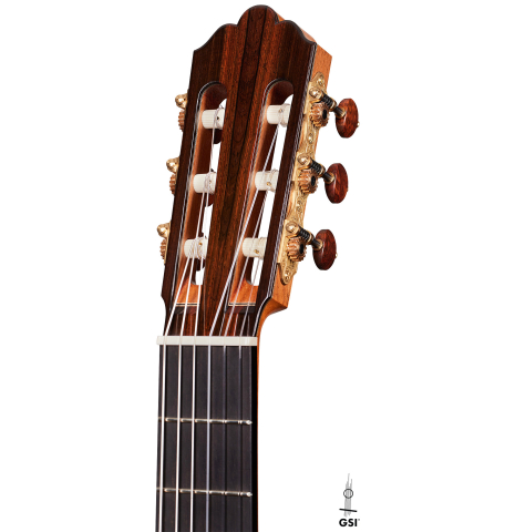 The headstock of a 2024 Jose Vigil classical guitar made of cedar and CSA rosewood.