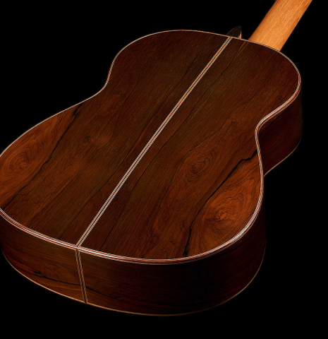 The back and sides of a 2025 Jose Vigil classical guitar made of cedar and CSA rosewood