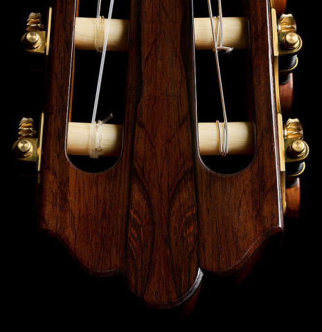 The headstock and tuning machines of a 2025 Jose Vigil classical guitar made of cedar and CSA rosewood