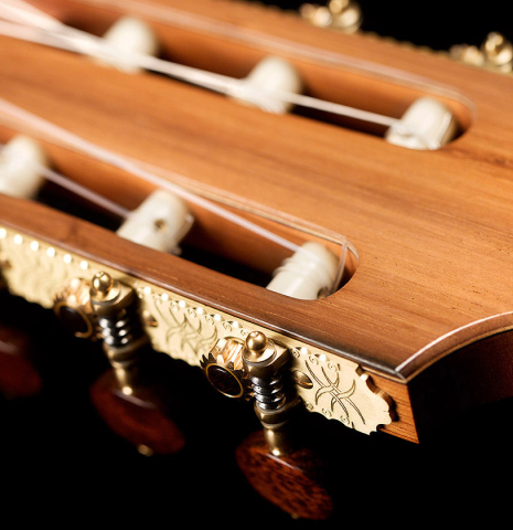 The headstock and machine heads of a 2022 Otto Vowinkel classical guitar made with spruce soundboard and CSA rosewood.