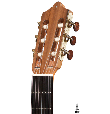 The headstock and tuners of a 2022 Otto Vowinkel classical guitar made with spruce soundboard and CSA rosewood.