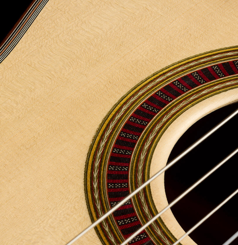 The soundboard and rosette of a 2026 Otto Vowinkel classical guitar made of spruce and CSA rosewood