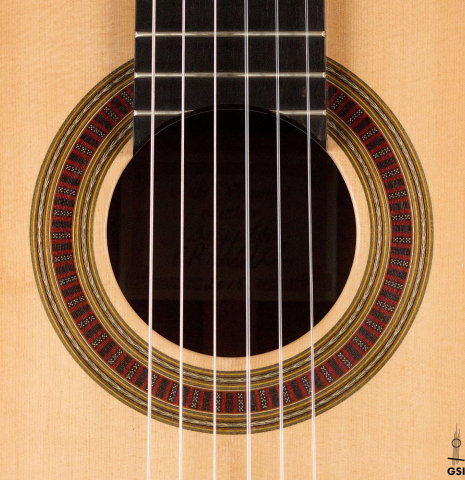 The rosette of a 2015 Otto Vowinkel classical guitar made of spruce and CSA rosewood