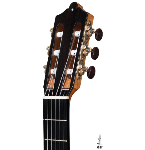 The headstock of a 2015 Otto Vowinkel classical guitar made of spruce and CSA rosewood