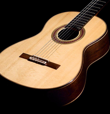 The soundboard of a 2015 Otto Vowinkel classical guitar made of spruce and CSA rosewood