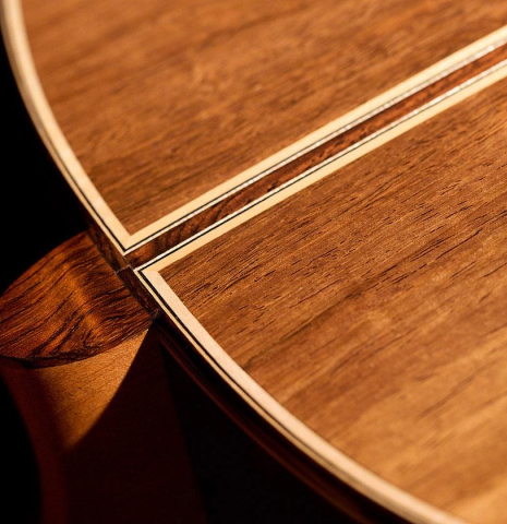 The back and heel of a 2015 Otto Vowinkel classical guitar made of spruce and CSA rosewood