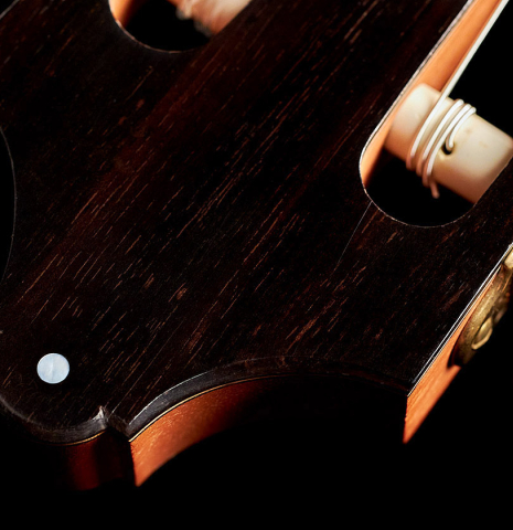 The headstock of a 2001 Otto Vowinkel 640 scale classical guitar made of spruce and CSA rosewood
