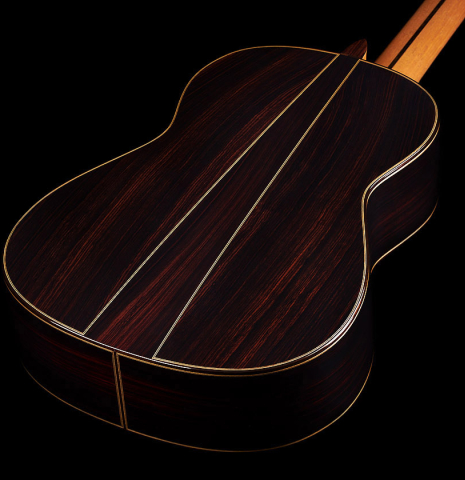The back and sides at the foot of a 2024 Otto Vowinkel "2a Double Top" classical guitar made of cedar and Indian rosewood