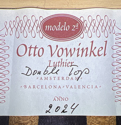 The label of a 2024 Otto Vowinkel "2a Double Top" classical guitar made of cedar and Indian rosewood