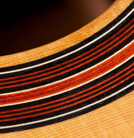 Detail of the rosette of a 2024 Otto Vowinkel "2a Double Top" classical guitar made of cedar and Indian rosewood