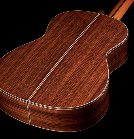 The back and sides of an Otto Vowinkel "2a Baritone" classical guitar made with spruce top and Indian rosewood back and sides.
