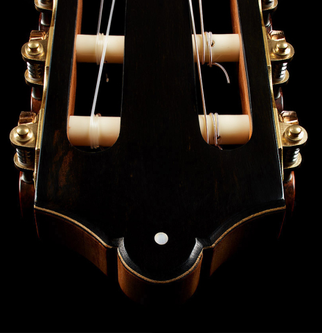 The headstock and tuning machines of a 2025 Otto Vowinkel classical guitar made with spruce and cocobolo