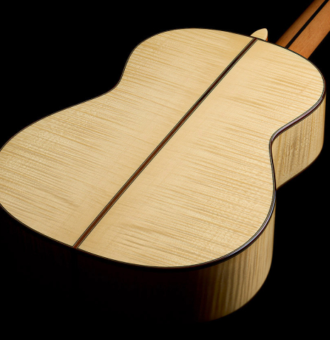 The back and sides of an Otto Vowinkel "2a" classical guitar made with spruce top and maple back and sides.