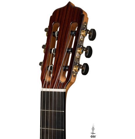 The headstock of an Otto Vowinkel "2a" classical guitar made with spruce top and maple back and sides.
