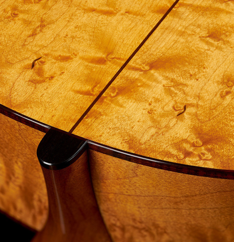 The back and sides at the heel of a 2023 Angela Waltner "Anima" classical guitar made of spruce and maple