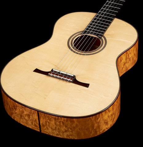 The top and sides of a 2023 Angela Waltner "Anima" classical guitar made of spruce and maple