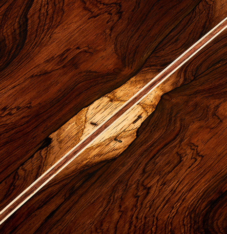 The back center seam of a 2025 Julia Wenzel classical guitar made of cedar and CSA rosewood