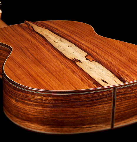 The back and sides of a 2022 Julia Wenzel classical guitar made of spruce and granadillo