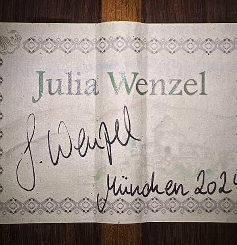 The label of a 2024 Julia Wenzel classical guitar made of cedar and African rosewood