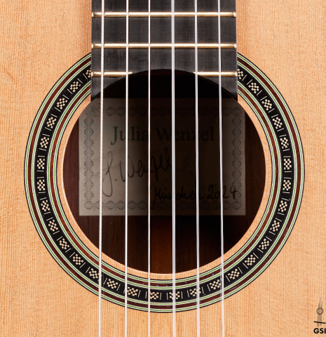 The rosette of a 2024 Julia Wenzel classical guitar made of cedar and African rosewood