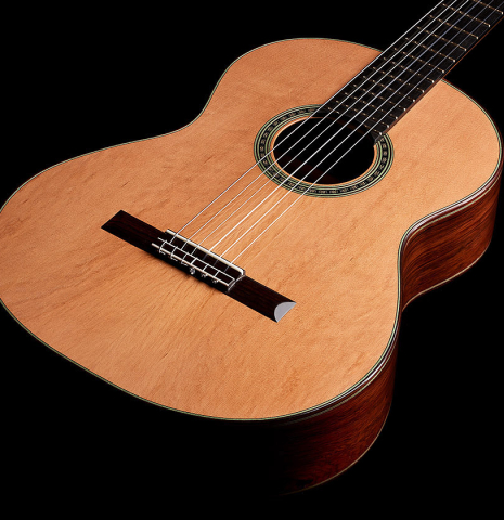 The soundboard of a 2024 Julia Wenzel classical guitar made of cedar and African rosewood