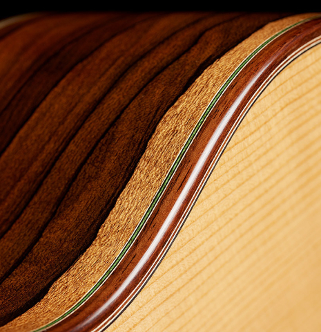 The top and side binding and purflings of a 2024 Julia Wenzel classical guitar made of spruce and ziricote