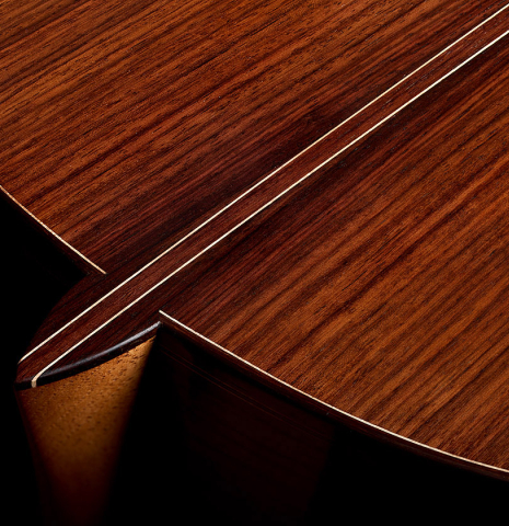 The heel, back binding and purfling of a 2026 Julia Wenzel classical guitar made of cedar and Indian rosewood