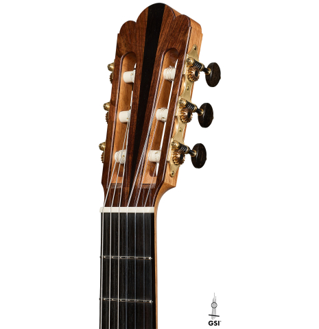 The headstock of a 2026 Julia Wenzel classical guitar made of cedar and Indian rosewood