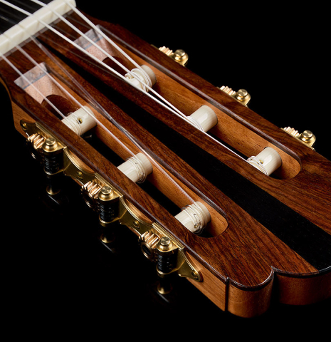 The headstock and tuning machines of a 2026 Julia Wenzel classical guitar made of cedar and Indian rosewood