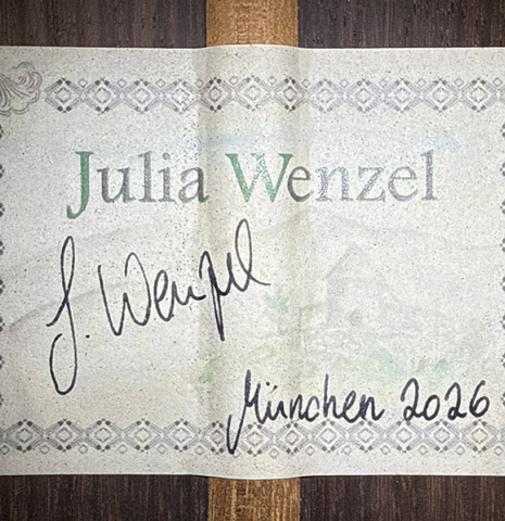 The label of a 2026 Julia Wenzel classical guitar made of cedar and Indian rosewood