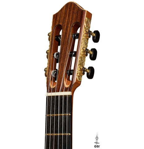 The headstock of a 2023 Ken Whisler classical guitar made of spruce and Indian rosewood