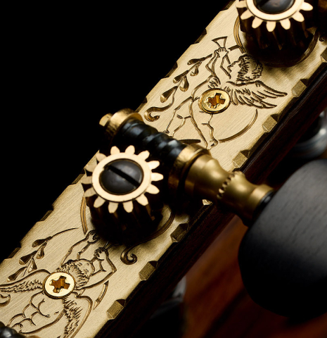 The tuning machines of a 2023 Ken Whisler classical guitar made of spruce and Indian rosewood