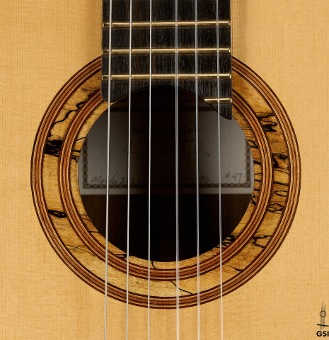 The rosette of a 2023 Ken Whisler classical guitar made of spruce and Indian rosewood